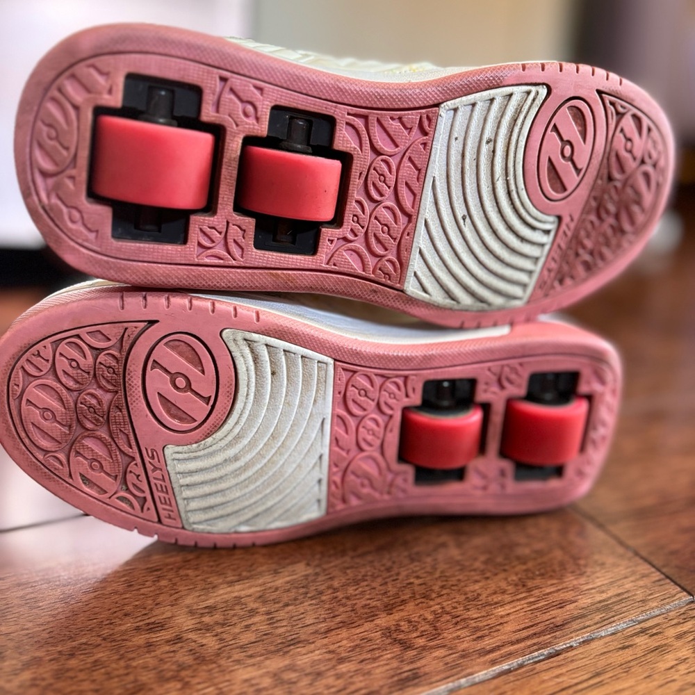 Pink/White Heelys, girls size 3, double wheels.
